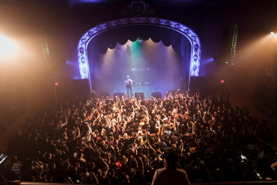 Crowd of People Watching Person Performing